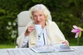 Senior woman relaxing in the garden Royalty Free Stock Photo