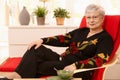 Senior woman relaxing at home Royalty Free Stock Photo