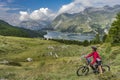 Woman with e mountainbike in the Engadin, Switzerland