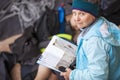 Senior Woman Rock Climber Holding Guide Book