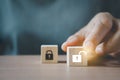 Hand choose wooden cubes with red unlocked key  for finding solutions concept. Business problem solving and make Royalty Free Stock Photo