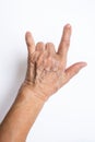 Senior woman`s hand symbol meaning