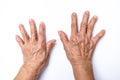 Senior woman`s hands counting 10 on white background, Numbers 1-10 in sign language