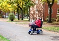 Senior woman with scooter 2