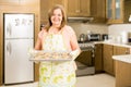 Senior woman showing her baked cookies Royalty Free Stock Photo