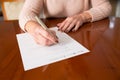 Senior Woman Signing Last Will And Testament At Home Royalty Free Stock Photo