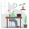 Senior woman sitting with laptop.