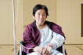 Senior woman sitting on wheelchair in hospital