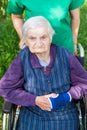 Senior woman sitting in wheelchair Royalty Free Stock Photo