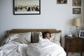 Senior woman sleeping alone on the bed Royalty Free Stock Photo