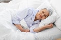 senior woman sleeping in bed at home bedroom Royalty Free Stock Photo