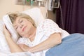Senior Woman Sleeping In Hospital Bed Royalty Free Stock Photo