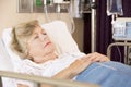 Senior Woman Sleeping In Hospital Bed Royalty Free Stock Photo