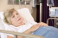 Senior Woman Sleeping In Hospital Bed Royalty Free Stock Photo