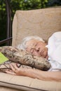 Senior woman sleeping outside Royalty Free Stock Photo
