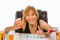 Senior Woman Gives Thumbs Up To All Her Medications Going Into Her Weekly Pill Box Royalty Free Stock Photo