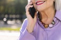 senior woman smiling happy talking by mobile phone Royalty Free Stock Photo