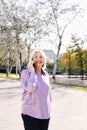 senior woman smiling happy talking by phone Royalty Free Stock Photo