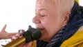 Senior woman speak loudhailer bullhorn closeup