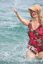 Senior woman splashing in sea Royalty Free Stock Photo