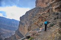 Senior woman standing at the edge of canyon Royalty Free Stock Photo