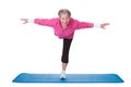 Senior woman standing on one leg and exercising Royalty Free Stock Photo