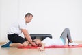 Senior woman stretching with physiotherapist Royalty Free Stock Photo