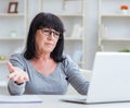 Senior woman struggling at computer Royalty Free Stock Photo