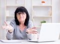 Senior woman struggling at computer Royalty Free Stock Photo