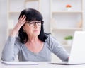 Senior woman struggling at computer Royalty Free Stock Photo