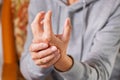 Senior woman suffering from hand and finger joint pain, inflammation Royalty Free Stock Photo