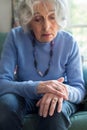 Senior Woman Suffering With Parkinsons Diesease Royalty Free Stock Photo