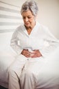Senior woman suffering from stomach ache Royalty Free Stock Photo