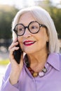 senior woman talking happy by mobile phone Royalty Free Stock Photo