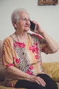 Senior woman talking on a mobile phone Royalty Free Stock Photo