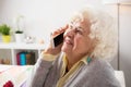 Senior woman talking on the phone