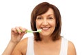 Senior woman with toothbrush brushing her teeth Royalty Free Stock Photo