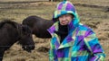 Senior woman trip in Iceland with icelandic horses Royalty Free Stock Photo