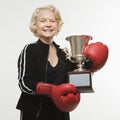 Senior woman with trophy Royalty Free Stock Photo