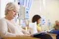 Senior Woman Undergoing Chemotherapy In Hospital Royalty Free Stock Photo