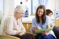 Senior Woman Undergoing Chemotherapy With Nurse Royalty Free Stock Photo