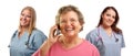 Senior Woman Using Cell Phone and Female Doctors Royalty Free Stock Photo