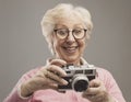 Senior woman using a digital camera Royalty Free Stock Photo