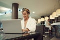Senior Woman Using Laptop in SPA Royalty Free Stock Photo
