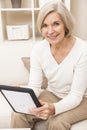 Senior Woman Using Tablet Computer Royalty Free Stock Photo