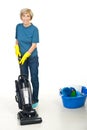 Senior woman using vacuum cleaner