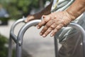 Senior woman using a walker cross street Royalty Free Stock Photo