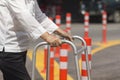 Senior woman using a walker cross street. Royalty Free Stock Photo