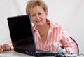 Senior woman using webcam Royalty Free Stock Photo