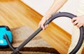 Senior woman vacuuming carpet at home Royalty Free Stock Photo